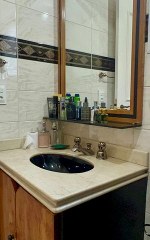 Casa de condomínio à venda com 450m², 3 quartos e 6 vagas Casa de condomínio à venda com 450m², 3 quartos e 6 vagasBanheiro da Suíte 2