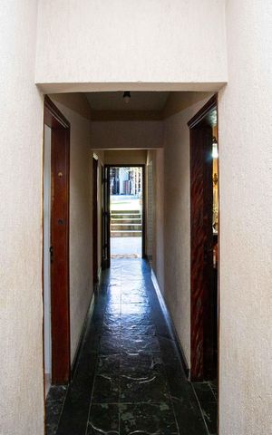 Casa à venda com 660m², 5 quartos e 8 vagasCorredor