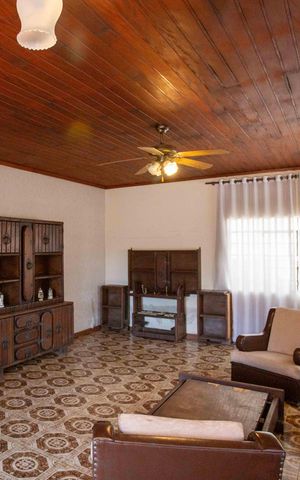 Casa à venda com 660m², 5 quartos e 8 vagasSala de TV