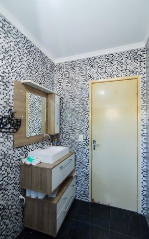 Casa à venda com 178m², 3 quartos e 2 vagasBanheiro da Suíte