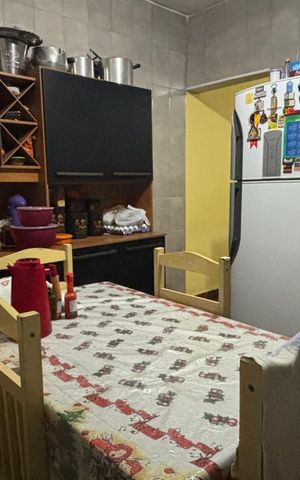 Casa à venda com 76m², 3 quartos e 2 vagas Casa à venda com 76m², 3 quartos e 2 vagasCozinha