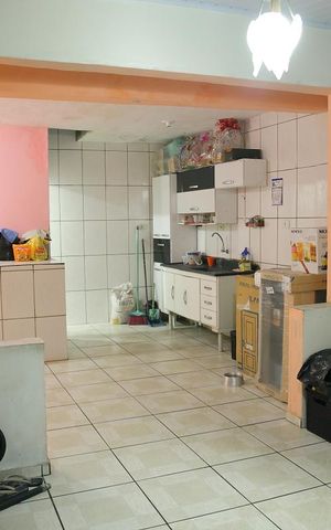 Casa à venda com 76m², 3 quartos e 2 vagasÁrea de convivência 