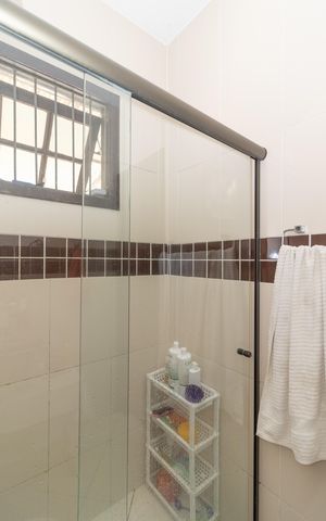 Casa à venda com 330m², 3 quartos e 4 vagas Casa à venda com 330m², 3 quartos e 4 vagasBanheiro da Suíte 3