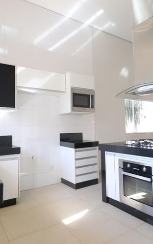 Casa de condomínio para alugar com 210m², 3 quartos e 3 vagasCozinha