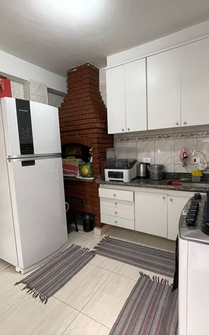 Casa de condomínio à venda com 150m², 4 quartos e 2 vagas Casa de condomínio à venda com 150m², 4 quartos e 2 vagasCozinha