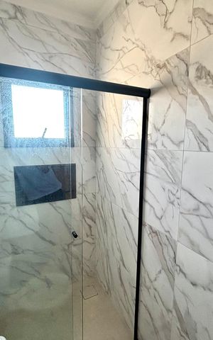 Casa à venda com 150m², 3 quartos e 2 vagas Casa à venda com 150m², 3 quartos e 2 vagasBanheiro da Suíte 1