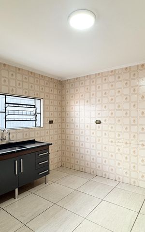 Casa à venda com 121m², 3 quartos e 2 vagas Casa à venda com 121m², 3 quartos e 2 vagasCozinha