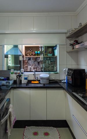 Casa à venda com 109m², 3 quartos e 2 vagas Casa à venda com 109m², 3 quartos e 2 vagasCozinha