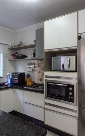 Casa à venda com 109m², 3 quartos e 2 vagas Casa à venda com 109m², 3 quartos e 2 vagasCozinha