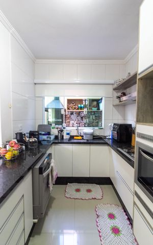Casa à venda com 109m², 3 quartos e 2 vagas Casa à venda com 109m², 3 quartos e 2 vagasCozinha