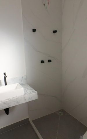 Casa à venda com 141m², 3 quartos e 2 vagasBanheiro da Suíte 1
