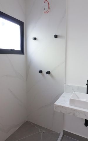 Casa à venda com 141m², 3 quartos e 2 vagasBanheiro da Suíte 2