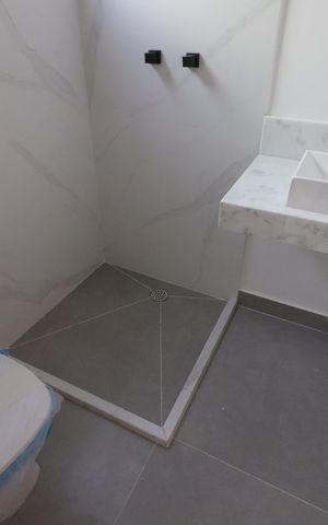 Casa à venda com 141m², 3 quartos e 2 vagasBanheiro da Suíte 2