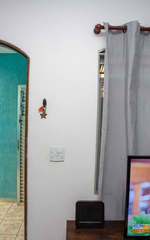 Casa à venda com 100m², 3 quartos e 2 vagasSala Casa 1
