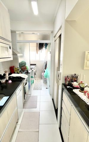 Apartamento à venda com 94m², 2 quartos e 3 vagas Apartamento à venda com 94m², 2 quartos e 3 vagasCozinha e Área de Serviço