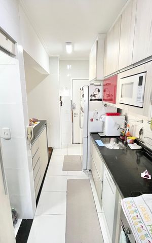 Apartamento à venda com 94m², 2 quartos e 3 vagas Apartamento à venda com 94m², 2 quartos e 3 vagasCozinha e Área de Serviço