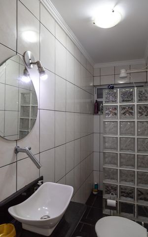 Casa à venda com 260m², 3 quartos e 2 vagasBanheiro 2