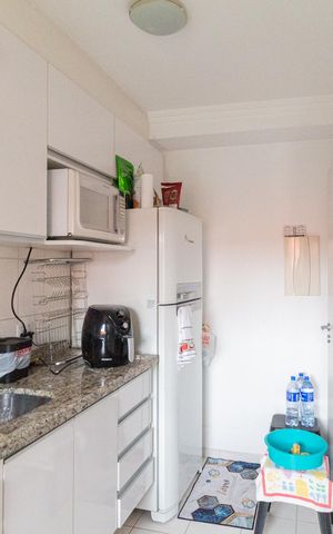 Apartamento à venda com 57m², 2 quartos e 1 vaga Apartamento à venda com 57m², 2 quartos e 1 vagaCozinha e área de serviço
