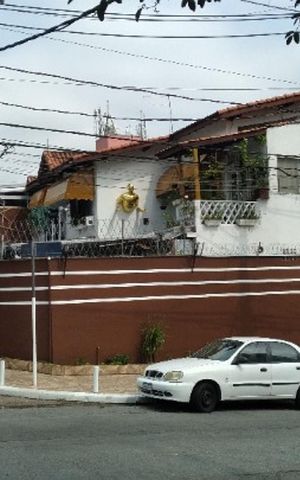Casa à venda com 192m², 3 quartos e 2 vagas Casa à venda com 192m², 3 quartos e 2 vagasFachada