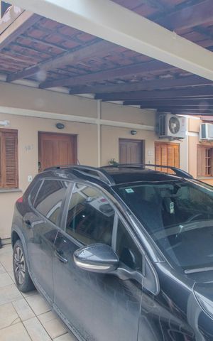 Casa de condomínio à venda com 100m², 3 quartos e 1 vaga Casa de condomínio à venda com 100m², 3 quartos e 1 vagaGaragem