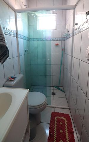 Casa à venda com 220m², 2 quartos e 2 vagasQuarto 2 - Suíte Banheiro 