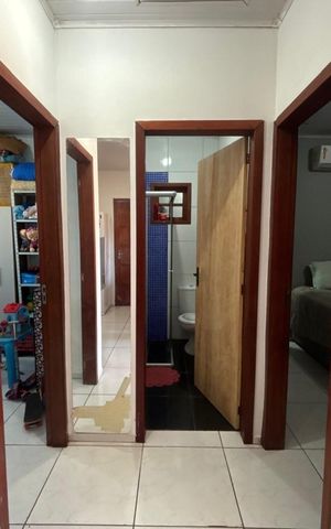 Casa à venda com 100m², 2 quartos e 2 vagas Casa à venda com 100m², 2 quartos e 2 vagasCorredor