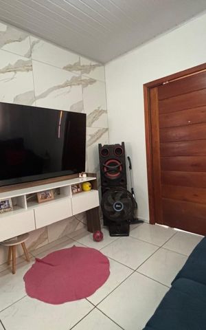 Casa à venda com 100m², 2 quartos e 2 vagas Casa à venda com 100m², 2 quartos e 2 vagasSala