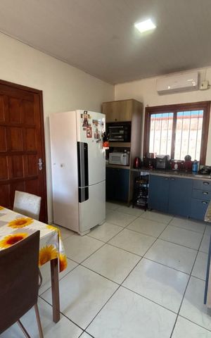 Casa à venda com 100m², 2 quartos e 2 vagas Casa à venda com 100m², 2 quartos e 2 vagasCozinha