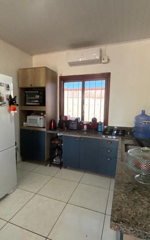 Casa à venda com 100m², 2 quartos e 2 vagas Casa à venda com 100m², 2 quartos e 2 vagasCozinha