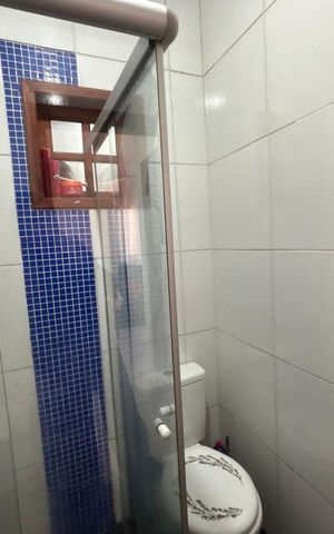 Casa à venda com 100m², 2 quartos e 2 vagas Casa à venda com 100m², 2 quartos e 2 vagasBanheiro social