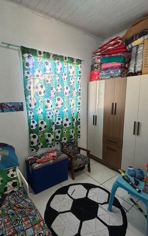 Casa à venda com 100m², 2 quartos e 2 vagas Casa à venda com 100m², 2 quartos e 2 vagasQuarto