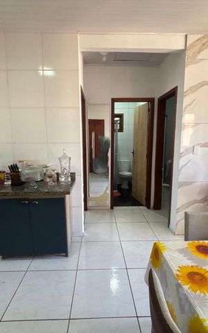 Casa à venda com 100m², 2 quartos e 2 vagas Casa à venda com 100m², 2 quartos e 2 vagasCozinha