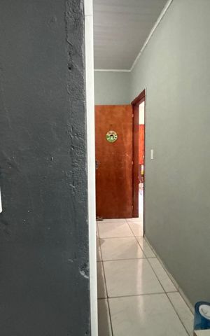 Casa à venda com 100m², 2 quartos e 2 vagas Casa à venda com 100m², 2 quartos e 2 vagasCorredor