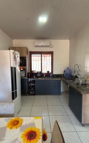 Casa à venda com 100m², 2 quartos e 2 vagas Casa à venda com 100m², 2 quartos e 2 vagasCozinha