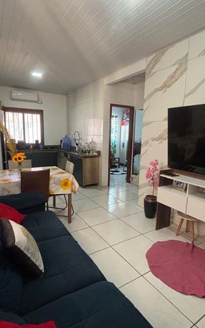 Casa à venda com 100m², 2 quartos e 2 vagas Casa à venda com 100m², 2 quartos e 2 vagasSala