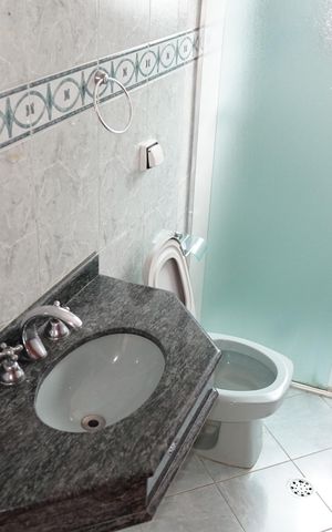 Casa à venda com 350m², 3 quartos e 3 vagasBanheiro 3