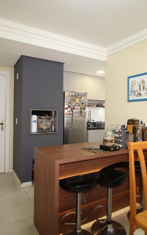Apartamento à venda com 58m², 2 quartos e 2 vagasSala/Cozinha
