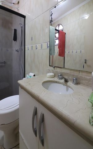 Casa à venda com 126m², 4 quartos e 1 vagaQuarto 1 - Suíte Banheiro 