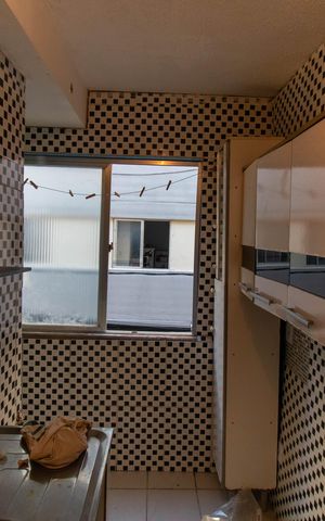 Apartamento à venda com 45m², 2 quartos e sem vaga Apartamento à venda com 45m², 2 quartos e sem vagaCozinha e Área de Serviço