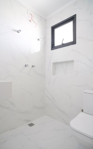 Casa à venda com 185m², 3 quartos e 2 vagasBanheiro da Suíte 2