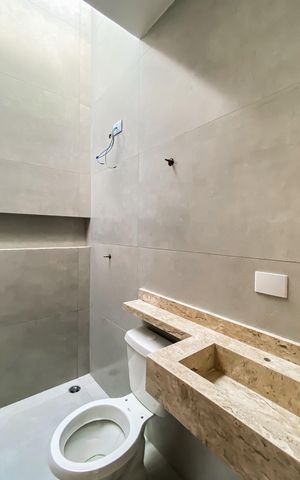 Casa à venda com 140m², 3 quartos e 2 vagasBanheiro 