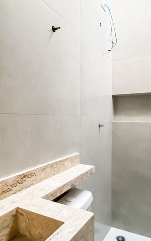 Casa à venda com 140m², 3 quartos e 2 vagasBanheiro da Suíte