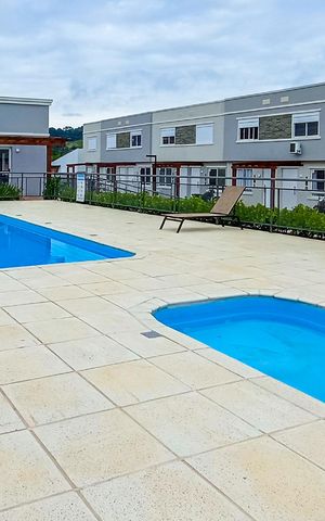 Casa de condomínio à venda com 60m², 2 quartos e 1 vaga Casa de condomínio à venda com 60m², 2 quartos e 1 vagaÁrea comum - Piscina