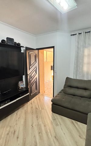 Casa à venda com 100m², 2 quartos e 2 vagas Casa à venda com 100m², 2 quartos e 2 vagasSala