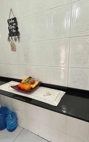Casa à venda com 100m², 2 quartos e 2 vagas Casa à venda com 100m², 2 quartos e 2 vagasCozinha