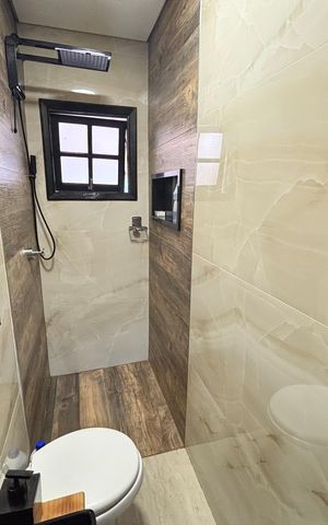 Casa à venda com 100m², 2 quartos e 2 vagas Casa à venda com 100m², 2 quartos e 2 vagasBanheiro 1