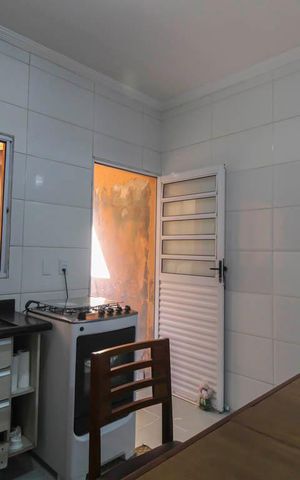 Casa à venda com 220m², 4 quartos e 2 vagas Casa à venda com 220m², 4 quartos e 2 vagasCozinha