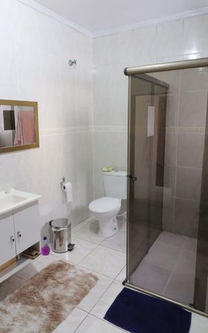 Casa à venda com 250m², 3 quartos e 2 vagasBanheiro da Suíte 1