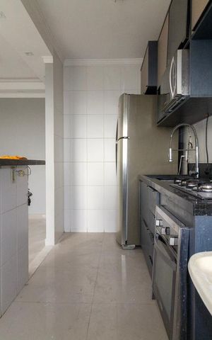 Apartamento à venda com 54m², 2 quartos e 1 vaga Apartamento à venda com 54m², 2 quartos e 1 vagaCozinha e Área de Serviço