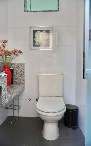 Casa à venda com 128m², 3 quartos e 2 vagas Casa à venda com 128m², 3 quartos e 2 vagasLavabo da Área Externa
